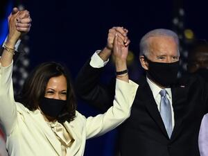 US President-elect Joe Biden and Vice President-elect Kamala Harris stand onstage after delivering remarks in Wilmington, Delaware, on November 7, 2020, after being declared the winners of the presidential election. Jim WATSON / AFP