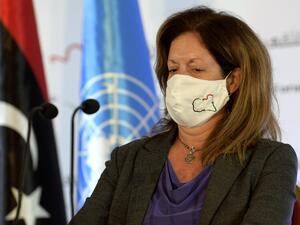 UN acting envoy to Libya Stephanie Williams wears a facemask as she arrives to speak during a press conference in the Tunisian capital Tunis on November 15, 2020, following seven days of talks, hosted by the UN on the Libyan conflict. The delegates "reached a preliminary roadmap for ending the transitional period and organising free, fair, inclusive and credible presidential and parliamentary elections," Williams told journalists. After years of conflict sparked by a 2011 NATO-backed uprising, Libya has two