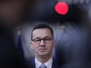  In this file photo taken on October 02, 2020 Poland’s Prime Minister Mateusz Morawiecki arrives on the second day of a European Union (EU) summit at The European Council Building in Brussels. Hungary and Poland blocked approval on November 16, 2020 of the EU's long-term budget and coronavirus rescue -- a 1.8-trillion-euro package -- and plunged the bloc into political crisis. Olivier HOSLET / POOL / AFP