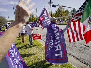 Americans head to the polls on the last day to cast their vote for incumbent U.S. President Donald Trump or Democratic nominee Joe Biden in the 2020 presidential election. Sandy Huffaker/Getty Images/AFP