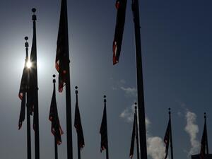 U.S. flags are seen on the ground of the Washington Monument in the morning hours of November 4, 2020 in Washington, DC. The nation awaits the results of a historic presidential election between President Donald Trump and his Democratic challenger, former Vice President Joe Biden with swing states still too close to call. Alex Wong/Getty Images/AFP ALEX WONG / GETTY IMAGES NORTH AMERICA / Getty Images via AFP