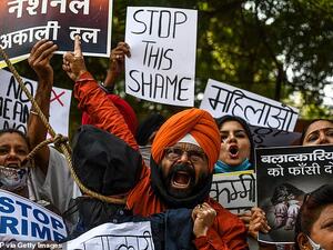Protesters in New Delhi on October 4 demand action following the gang-rape and murder of a 19-year-old woman. (AFP/File)