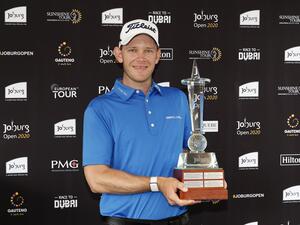 Hansen with the Joburg Open trophy (Photo: Supplied)