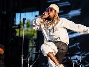 Wayne, whose real name is Dwayne Michael Carter, Jr., has a felony gun conviction from New York back in 2009 