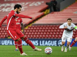 The former Reds striker believes the Egyptian is merely doing what is expected of him when going to ground under contact inside the box (Photo: AFP)