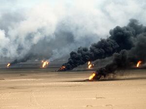 Oil well fires rage outside Kuwait City in the aftermath of the First Gulf War (Shutterstock)