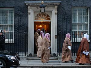 n this file photo taken on March 7, 2018, members of Saudi Arabia's Crown Prince Mohammed bin Salman's delegation leave 10 Downing Street, in central London. A decade on, the turmoil of the Arab Spring which shook the oil-rich Gulf states has left a very different legacy, emboldening and empowering their conservative monarchies. The collapse or decline of traditional Middle East powers like Syria and Egypt has allowed the region to establish itself as the region's new centre of gravity. And the Gulf has sei