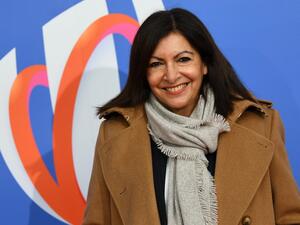 Paris' city mayor Anne Hidalgo poses on the red carpet as she arrives on December 14, 2020 in Paris, to attend the draw for the 2023 Rugby Union World Cup pool stages which will be hosted by France. FRANCK FIFE / AFP