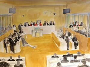 This court sketch made on December 16, 2020 shows a general view at the Paris courthouse during the sentencing hearing in the trial of 14 suspected accomplices of the Islamist gunmen who murdered seventeen people over three days of attacks in January 2015, beginning with the massacre of 12 people at the satirical weekly Charlie Hebdo. Marie WILLIAMS / AFP