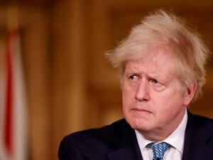 Britain's Prime Minister Boris Johnson speaks during a virtual press conference inside 10 Downing Street in central London on December 21, 2020, after a string of countries banned travellers and all but unaccompanied freight arriving from the UK, due to the rapid spread of a new, more-infectious coronavirus strain. Countries around the world closed their borders to Britain Monday in a race to contain a fast-spreading variant of the coronavirus as the European Union neared approval of its first jab for the b