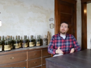 Nick Drummond and Patrick Bakker said they had heard while preparing to purchase their home in Ames that it might have belonged to a bootlegger in the 1920s. (Screenshot/ Video)