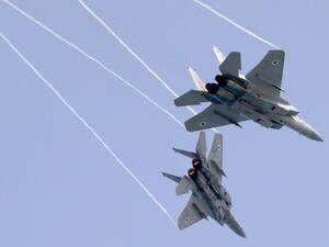 Israeli F-15 fighter jets rehearsing in Tel Aviv on Thursday for an air show to commemorate the 70th anniversary of the creation of Israel next month. Photo: AFP