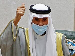 Emir of Kuwait Sheikh Nawaf Al-Ahmad Al-Jaber al-Sabah gestures in greeting upon arrival to attend the opening of the 5th regular session at the country's National Assembly (parliament) in Kuwait City on October 20, 2020. (File/AFP)