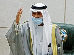 Emir of Kuwait Sheikh Nawaf al-Ahmad al-Jaber al-Sabah gestures during a parliament session. (AFP)