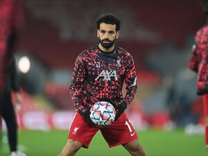 The Egyptian forward stepped off the bench to score two and lay on another for the Reds as they crushed the hapless Eagles at Selhurst Park (Photo: AFP)