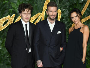 Brooklyn Beckham, David Beckham & Victoria Beckham at The Fashion Awards 2018. (shutterstock)