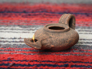 Ancient ceramic oil-lamp (Shutterstock)