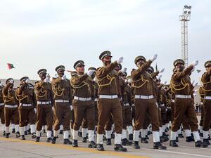Libyan cadets attend a graduation ceremony for new batches of students from the Military College in the Libyan capital Tripoli, on December 26, 2020. Turkey's Defence Minister Hulusi Akar made a surprise trip to Libya today, two days after strongman Khalifa Haftar urged his fighters to drive out Turkish forces from the oil-rich country. AFP