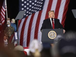 US President Donald Trump speaks during a rally in support of Republican incumbent senators Kelly Loeffler and David Perdue ahead of Senate runoff in Dalton, Georgia on January 4, 2021. SANDY HUFFAKER / AFP