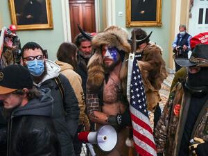 Authorities announced new arrests and charges on January 9, 2021, over the violent incursion into the US Capitol, including Jacob Anthony Chansley, also known as Jake Angeli, and two others -- one of them a newly elected state official -- were charged in federal court in connection with the violence, according to the US attorney's office for the District of Columbia. Saul LOEB / AFP