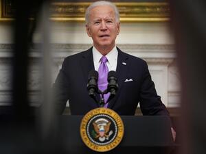 US President Joe Biden speaks about the Covid-19 response before signing executive orders in the State Dining Room of the White House in Washington, DC, on January 21, 2021.  MANDEL NGAN / AFP