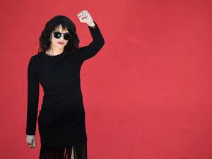 In this file photo taken on May 19, 2018 Italian actress Asia Argento gestures as she arrives on the red carpet for the closing ceremony of the 71st edition of the Cannes Film Festival in southern France. In an interview published on January 22, 2021 with Italian daily Corriere della Sera, leading #MeToo figure Asia Argento made fresh accusations of sexual abuse, directed at "The Fast and the Furious" US director Rob Cohen, saying the assault happened while she was filming Cohen's action movie "xXx" in 2002