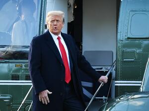 this file photo taken on January 20, 2021 outgoing US President Donald Trump boards Marine One at the White House in Washington, DC. MANDEL NGAN / AFP