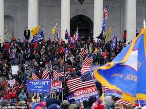 Insurrection: Trump supporters invaded the Capitol on Wednesday shortly after the president had repeated his false claims of election fraud in a fiery speech near the White House. (AFP)