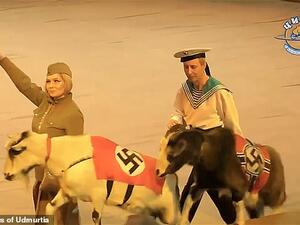 Prosecutors in Russia have launched a probe into a circus performance featuring a monkey in Nazi uniform and a goats parading in swastikas.(State Circus of Udmurtia)