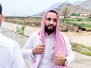 The boy had fallen from the river's edge into the murky waters below. (Twitter)