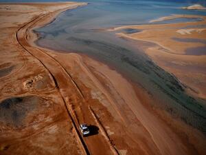 Mini's driver Stephane Peterhansel and his co-driver Edouard Boulanger of France compete by the Red Sea during Stage 9 of the Dakar Rally 2021 (Photo: AFP)