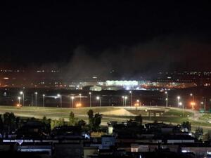 تصاعد الدخان بعد ورود أنباء عن سقوط قذائف هاون قرب مطار اربيل