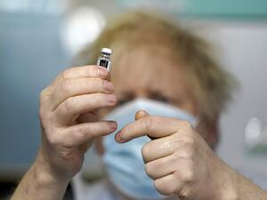 Britain has set itself an ambitious goal of vaccinating 15 million of the most vulnerable people by mid-February, and the entire adult population by the autumn. A total of 598,389 people in the UK received a first vaccine dose on Saturday, the highest daily figure since the rollout began.  Jon Super / POOL / AFP