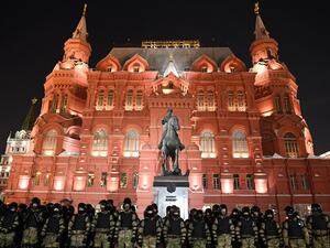 Law enforcement officers stand guard in front of a monument to Soviet Marshal Georgy Zhukov outside Red Square in Moscow on February 2, 2021. Kirill KUDRYAVTSEV / AFP