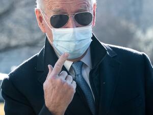 US President Joe Biden walks from Marine One after arriving on the South Lawn of the White House in Washington, DC, February 8, 2021, following a weekend in Delaware. SAUL LOEB / AFP