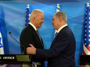 In this file photo taken on March 09, 2016, US Vice President Joe Biden and Israeli Prime Minister Benjamin Netanyahu shake hands while giving joint statements at the prime minister's office in Jerusalem. President Joe Biden will talk "soon" with Israeli Prime Minister Benjamin Netanyahu but has no "specific" plan to do so yet, the White House said on February 11, 2021, underlining an apparent distancing in the key relationship.  DEBBIE HILL / POOL / AFP
