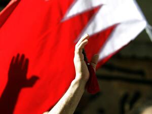 In this file photo taken on March 22, 2011 Bahraini Shiite wave a Bahrain flag as they attend the funerals of a man in central Manama. With a popular, reform-minded crown prince newly installed as prime minister, and a decade passed since the Arab Spring, Bahrain should be well placed to cast off the painful legacy of its uprising. The Pearl monument in downtown Manama -- the centre of the protests before they were crushed with the help of Saudi forces -- has long since been razed. But the nation's wounds remain raw and there is still no room for dissent.  Joseph EID / AFP  In this file photo taken on March 22, 2011 Bahraini Shiite wave a Bahrain flag as they attend the funerals of a man in central Manama. With a popular, reform-minded crown prince newly installed as prime minister, and a decade passed since the Arab Spring, Bahrain should be well placed to cast off the painful legacy of its uprising. The Pearl monument in downtown Manama -- the centre of the protests before they were crushed with the help of Saudi forces -- has long since been razed. But the nation's wounds