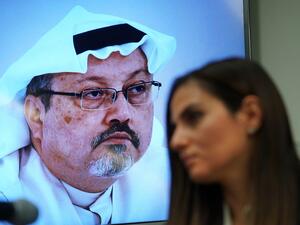 In this file photo Sherine Tadros, head of New York (UN) Office of Amnesty International, speaks during a news conference at the United Nations on October 18, 2018 next to a photo of Jamal Khashoggi. A US intelligence report on the murder of journalist Jamal Khashoggi in the Saudi consulate in Istanbul will be out "soon," the White House said on February 24, 2021. Press Secretary Jen Psaki said that President Joe Biden was also "soon" due to speak with Saudi Arabia's King Salman.  TIMOTHY A. CLARY / AFP
