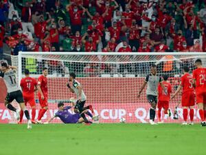 Al-Ahly's midfielder Hussein El-Shahat runs after scoring during the FIFA Club World Cup second round match against Egypt's Al-Ahly  (Photo: AFP)