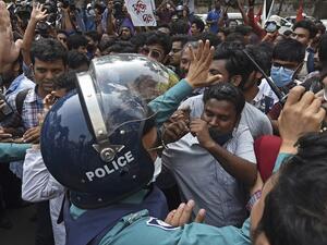 Activists scuffle with police 