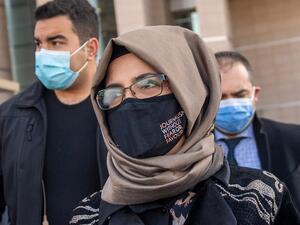 Hatice Cengiz (C) fiancee of slain Saudi dissident journalist Jamal Khashoggi