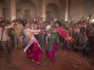 Hindu devotees take part in a traditional gathering during the Lathmar Holi celebrations