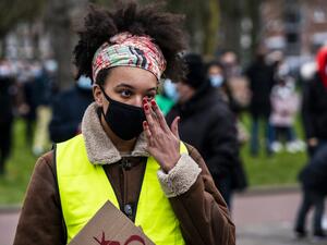Demonstrators protest at a police station against racism in Rotterdam