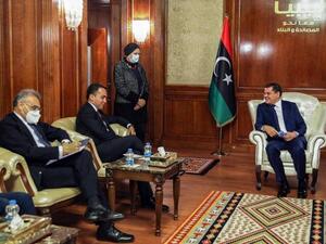Italian Foreign Minister Luigi Di Maio (C)  with new Libyan PM Abdul Hamid Dbeibah (R)