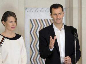 الرئيس السوري بشار الأسد وزوجته