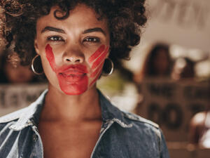 A female activist in red 