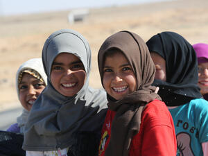 Syrian kids say cheese at Jordan's Zaatari Refugee Camp