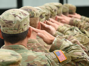 (Shutterstock) American troops salute