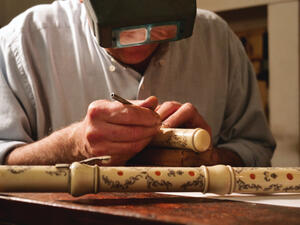 Flute-maker spreading love and bring smiles