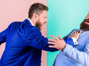 Business partners competitors office colleagues tense faces conflict situation